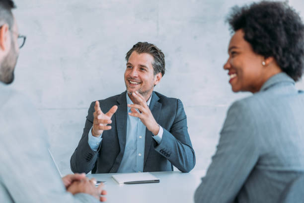 istock Group of business persons talking in the office. 1485297572