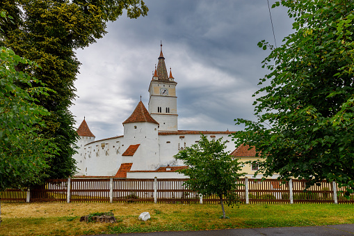 Honigberg, Brasov, Romania - June 28, 2022: The fortified church of Honigberg at Brasov in Romania