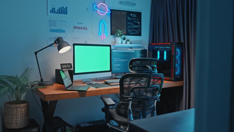 Desktop Computer with Mock Up Green Screen Chroma Key on the Desk in the home office