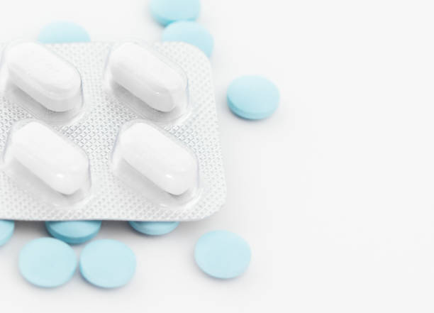 istock Blister pack with white tablets and blue pills. 1485305953