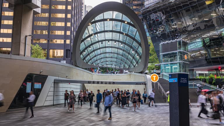 4K Footage Time lapse of Crowded Commuter people and Passenger walking in rush hour Morning  at Wynyard Transportation station, Sydney