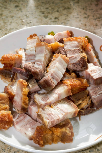 istock A dish of Cantonese stew, crispy roast pork close-up 1485308641