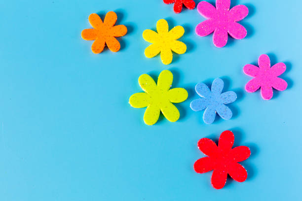 istock Flower eva foam rubber for decoration isolated on blue background, Decorative foam rubber material for creating artificial handmade flower, View from above. 1485311108
