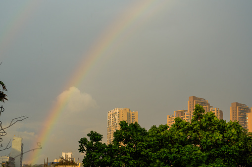 A double rainbow appeared over the city after the rain