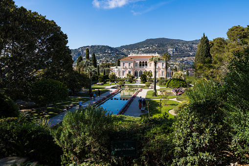 Villa Ephrussi de Rothschild, Italian Renaissance style, and its garden on a sunny day