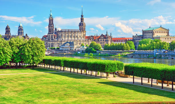 Riverbank of Elbe river with Hofkirche church and Semper Opera House on background in Dresden, Germany