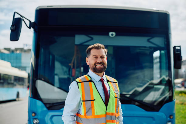 istock Portrait of happy bus driver looking at camera. 1485323629