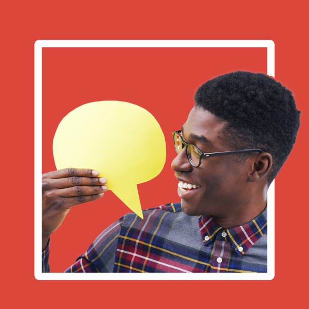istock Speech bubble, mockup and man in studio for advertising, space and poster against red background. Billboard, branding and paper copy space by male excited about marketing, product placement or brand 1485328283