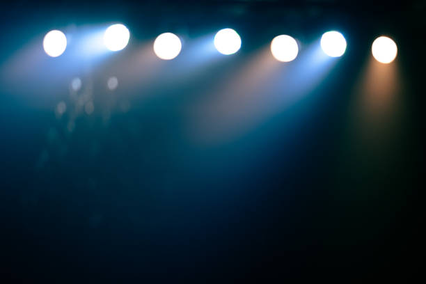 istock Blurred defocused flashlight effect and disco blue light party in the club at night around the dark, multicolor of the disco electric light in the club or pub. 1485332140