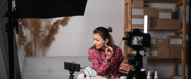 istock Young hispanic woman live streaming for beauty vlogger or blogger recording make up tutorial presenting for social people.influencer in social online. 1485332746