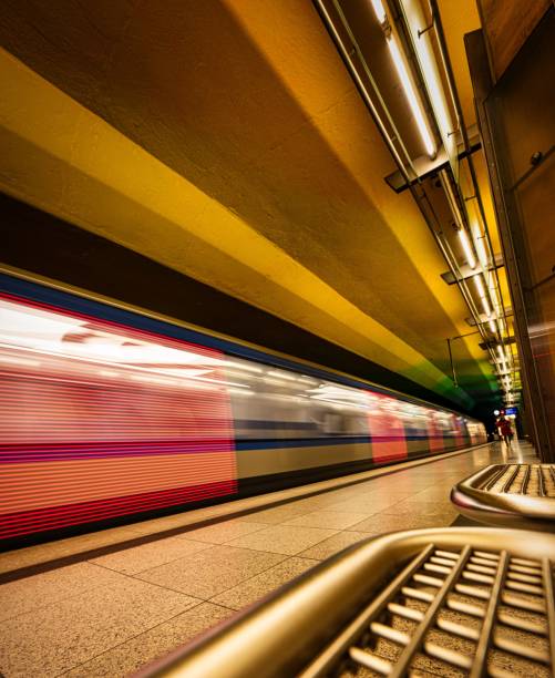 istock Long exposure shot of a train in motion along an empty railway platform 1485340224