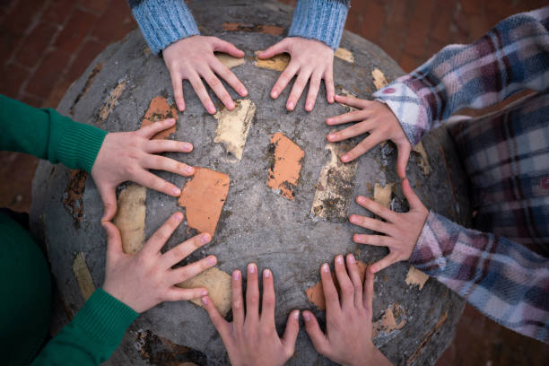 istock Children's hands at the table outdoors 1485344464