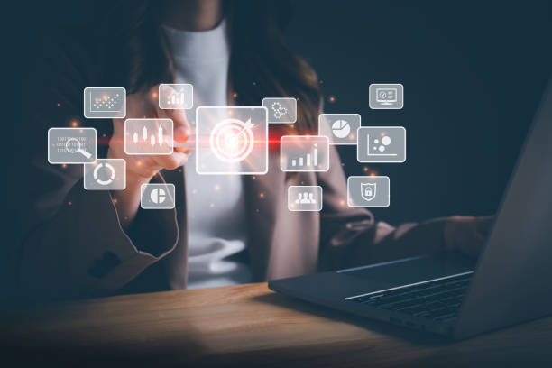 istock Businesswoman working on laptop and using a stylus pen for big data analytics and business intelligence with chart and graph icons. Goal acheiveement and success concept. Digital screen. 1485344621