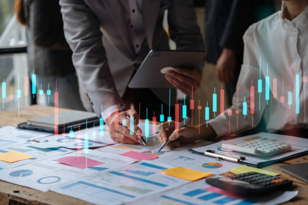 istock Business team present. professional investor working new start up project. tablet laptop computer with digital marketing media in the office. 1485345286