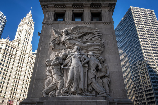 Michigan Avenue bridge relief in Chicago. The relief dates back to 1920 and called Regeneration depicts workers rebuilding Chicago after the Great Chicago Fire of 1871.