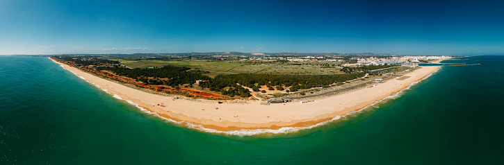 Aerial panoramic drone beach view of Vilamoura and Praia de Falesia, Algarve, Portugal
