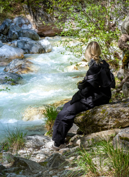 istock Inspiring walk along the mountain river in spring in Aridea 1485350587