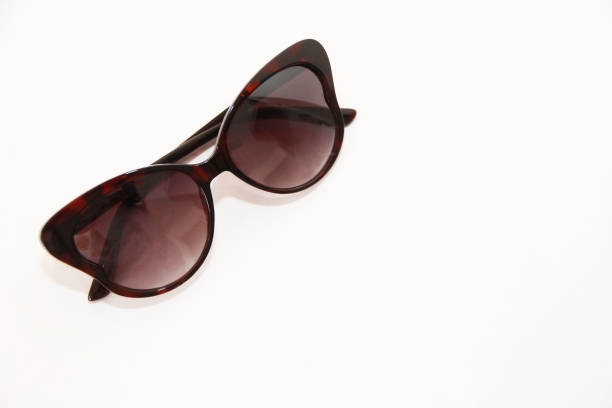 istock Beautiful women's sunglasses in a plastic frame on a white background 1485352975