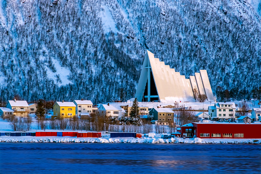 Tromso Cityscape and Arctic Cathedral Church in Norway at Sunrise.