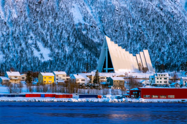 Tromso Cityscape Tromso Cityscape and Arctic Cathedral Church in Norway at Sunrise. tromso stock pictures, royalty-free photos & images