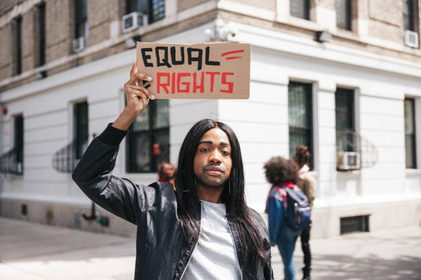 istock Non-binary person portrait with a Equal rights sign on cardboard 1485353024
