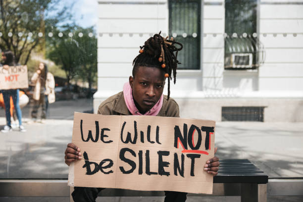 istock Young man portrait with a Equal rights sign on cardboard 1485353463