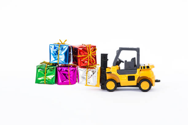 istock Forklift truck with colorful gift box isolate on white background, present delivery 1485356639