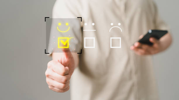 istock Man touching the virtual screen on the happy smiley face icon and five star to assessment satisfaction in service. Rating very impressed. Customer service, testimonial and satisfaction concept. 1485356836