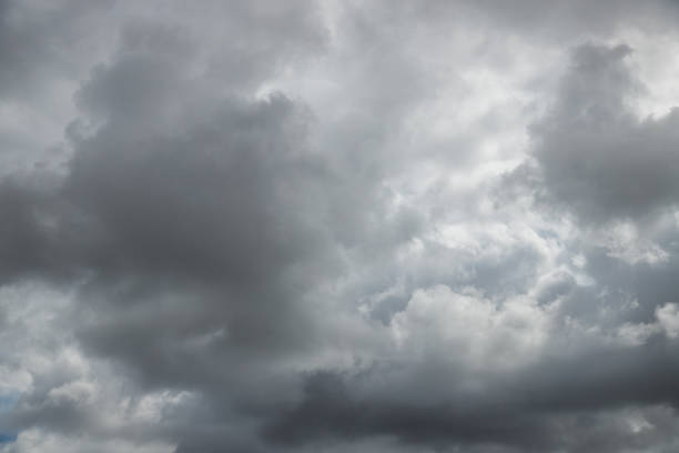 istock Dramatic background caused by dark clouds in the sky. Forecast of rain, thunderstorm, bad weather. The beauty of nature. Abstract background image. 1485359463