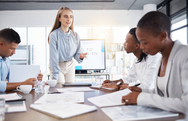 istock Meeting, presentation and business people with documents for planning, discussion and ideas. Teamwork, collaboration and group of managers working on finance review, project and marketing strategy 1485360181