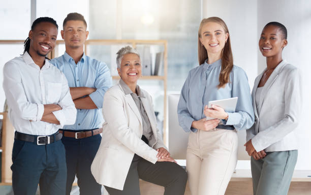 istock Diversity, portrait and business with staff, teamwork and partnership in modern office, planning and confident. Coworkers, multiracial and employees in workplace, brainstorming and new project ideas 1485360185