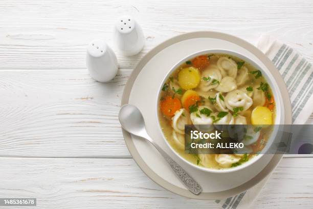 Soup With Pelmeni Dumplings A Dish Of Russian Cuisine Closeup On The Bowl Horizontal Top View Stock Photo - Download Image Now