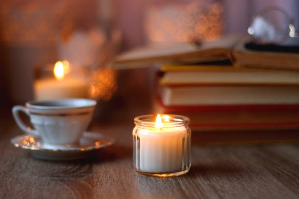 istock Books, Glasses, E-Reader, Pen, Tea, Cookies and Candles 1485362219