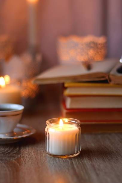 istock Books, Glasses, E-Reader, Pen, Tea, Cookies and Candles 1485362220