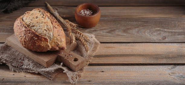 istock Fresh baked whole grain bread with flax seeds 1485363621
