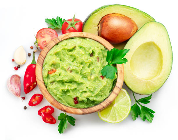 istock Guacamole and guacamole ingredients isolated on white background. Flat lay. 1485363747