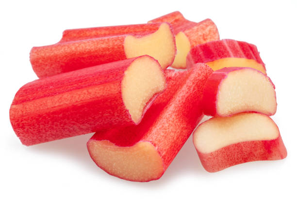 istock Red rhubarb stems' cuts isolated on white background. 1485364118