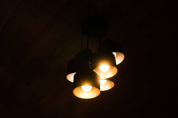 istock Black minimalist lamp in modern loft-style cafe or home. Cool interior design idea. 1485370767
