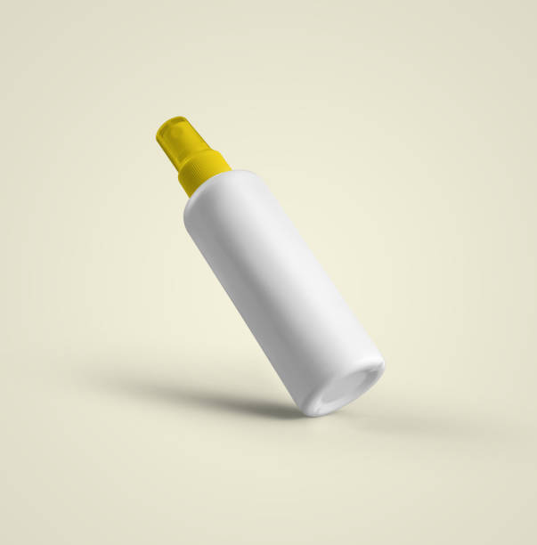 istock 3D rendering blank white cosmetic plastic spray bottle with yellow cap isolated on grey background. fit for your mockup design. 1485373188