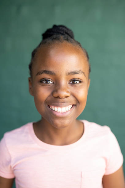 istock Portrait young girl smiling at camera 1485373216