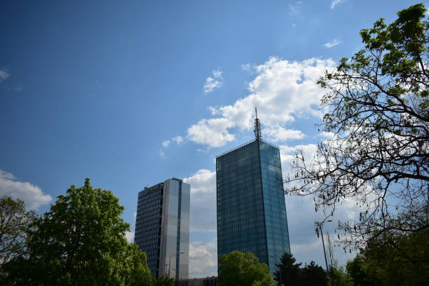 istock modern office building near a park 1485373646