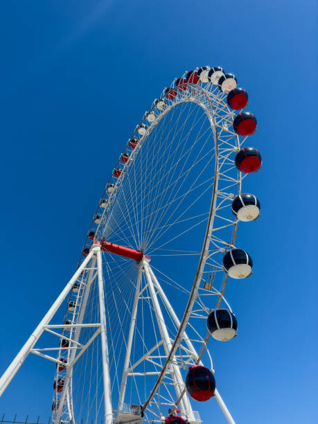 istock ferris wheel and blue sky 1485378477
