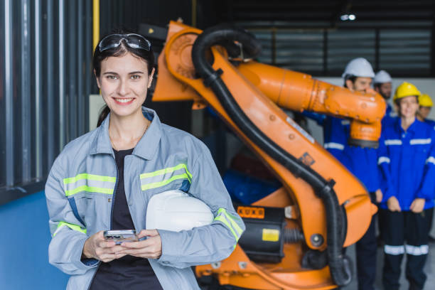 istock Engineer woman team worker work in Machine Robotic modern Automation Industry. Mechanic staff employee in metal factory. 1485379102