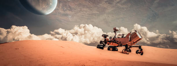 istock Mars rover exploring surface of Mars. Image of automated robotic space autonomous vehicle on the red Mars planet. Space exploration, astronomy science concept. 3D render 1485380558