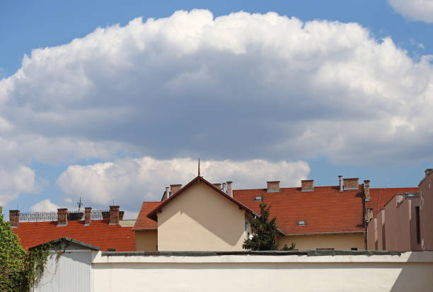 Cloudy sky over old buildings in the city