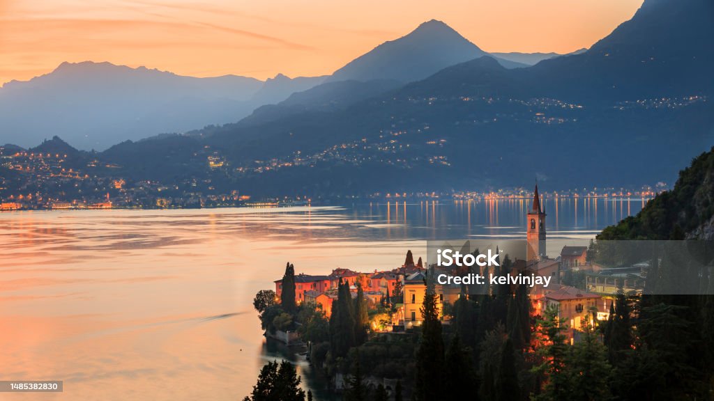 Sunset looking over Varenna on Lake Como, Italy Stunning view at dusk looking over Varenna on Lake Como, Italy Lake Como Stock Photo