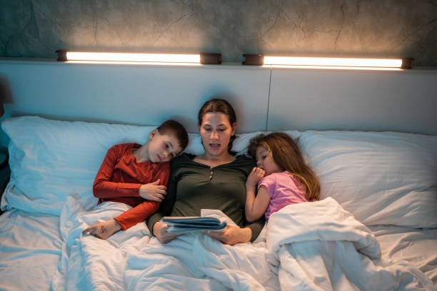 istock Mom reading bed time stories 1485397083