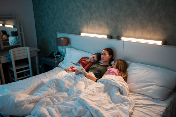 istock Mother reading bed time stories 1485399354