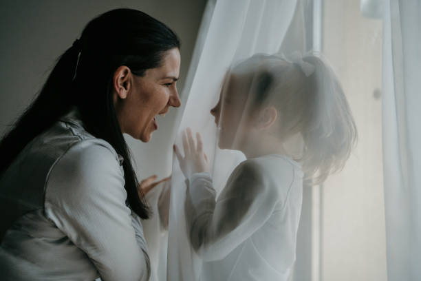 istock Mother and little daughter at home 1485400501