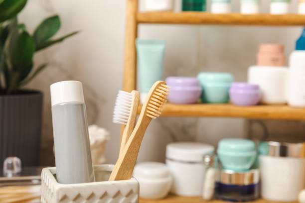 istock Eco bamboo toothbrushes and toothpaste tube mockup in the bathroom. Toothbrushes on the background of cosmetics on the shelf. Beauty concept. Dental car. 1485401823